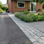 Sådan laver du elegante overgange mellem indkørsel og terrasse